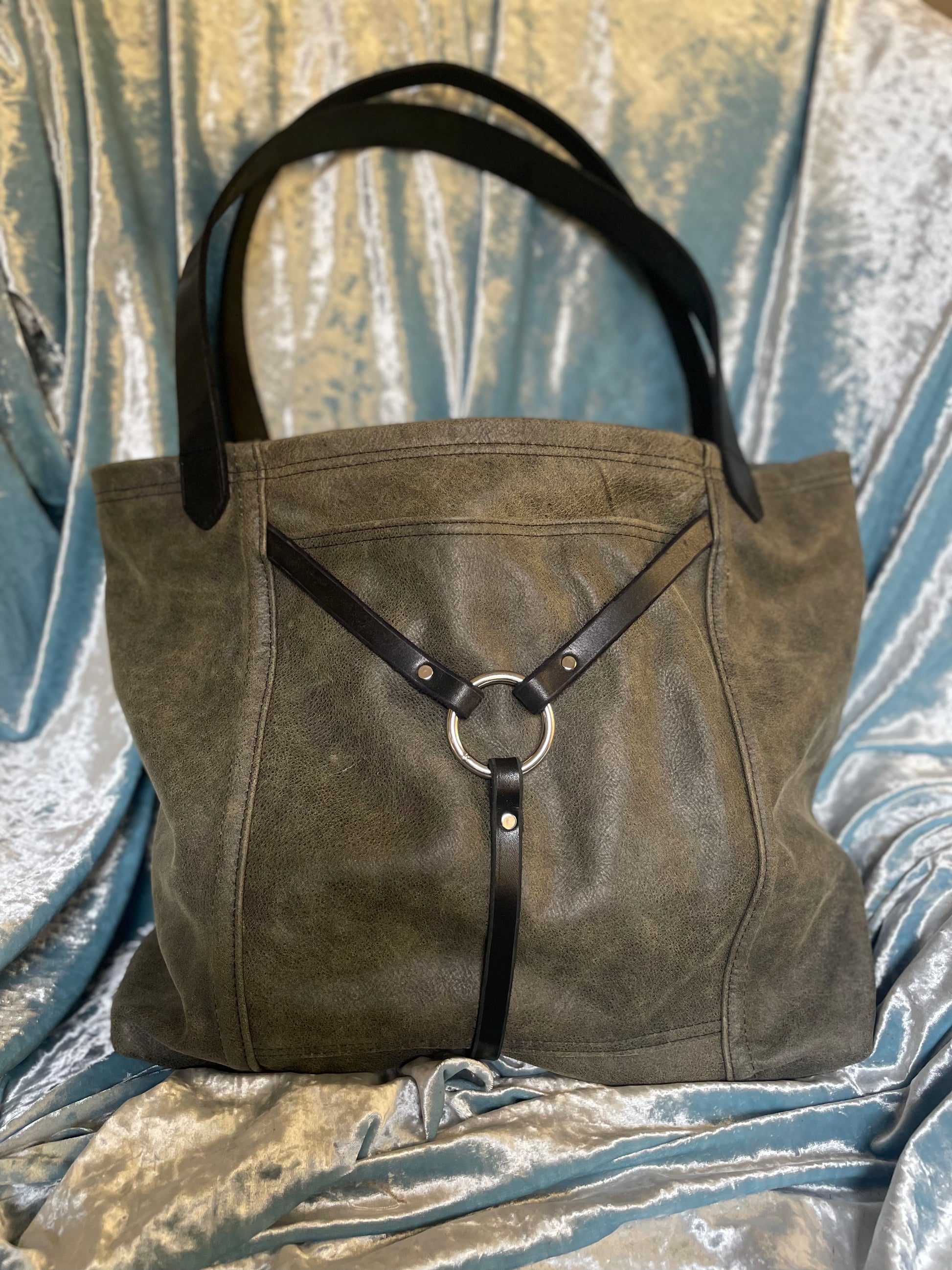 Olive Leather tote with black harness detail.