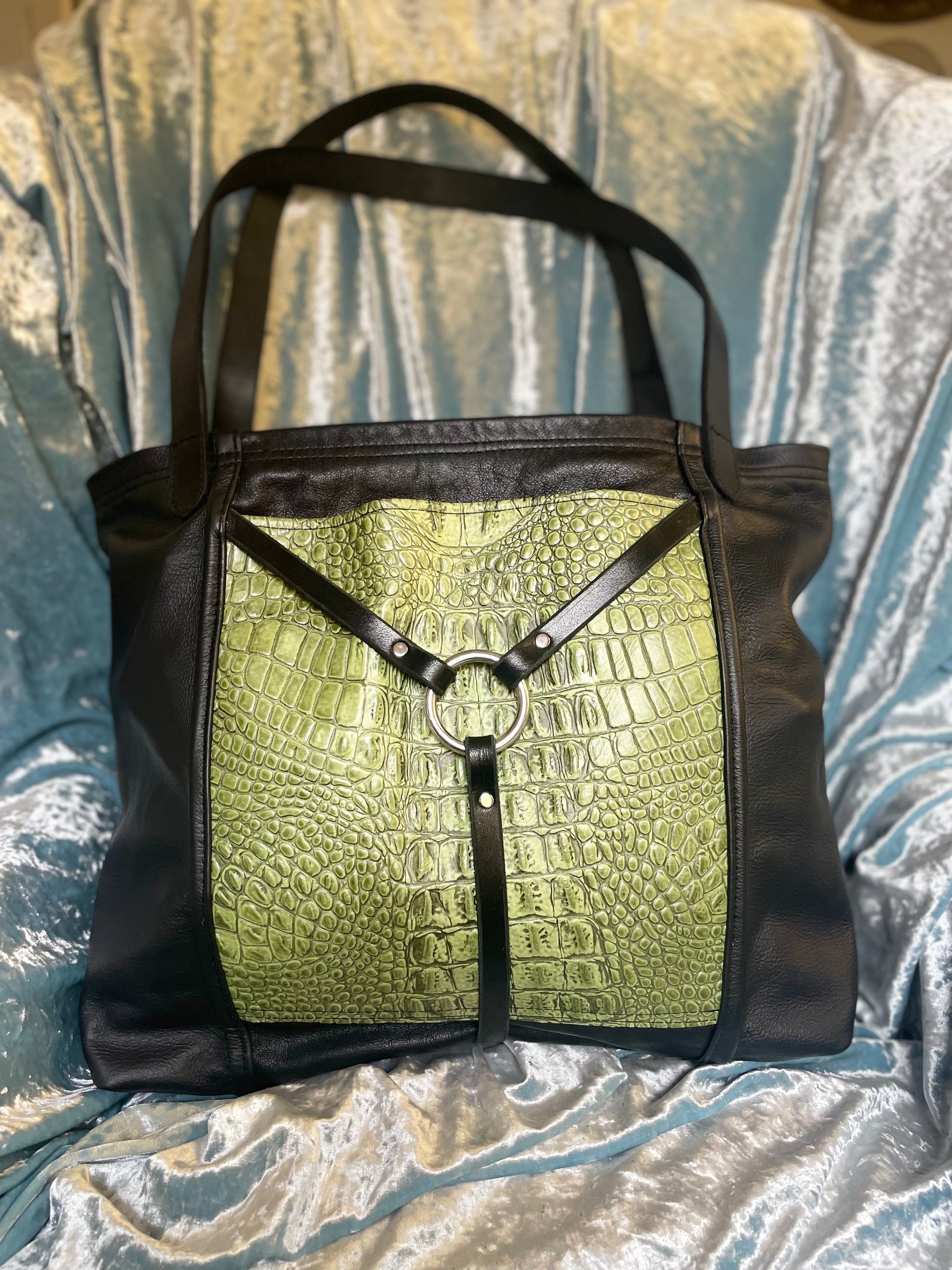 Black Leather tote, green croc pockets and a black harness detail